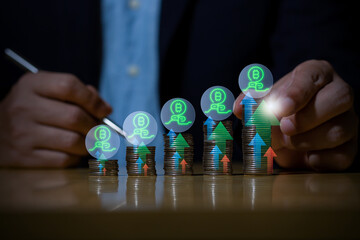 Businessman putting down money, pointing with pen and showing candlestick symbol for investing, finance, saving money, interest rate or dividend investment, business growth concept.