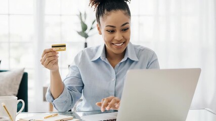 Cheerful Black Woman Making Online Payment with Credit Card