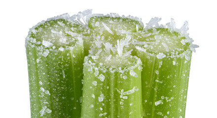Close-up of Fresh Celery Stalks with Crystalline Salt Formation on White Background