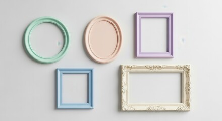 Fototapeta premium Collection of colorful pastel picture frames hanging on white wall