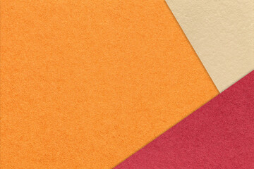 Fototapeta premium Abstract orange, beige, red paper background with copy space. Template for presentation, banner, card design