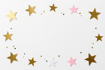 Elegant star frame on a clean white background with scattered confetti creating a festive and celebratory design for various creative projects