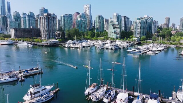 Aerial Panorama of Vancouver&rsquo;s Waterfront Marina with Rowers, Yachts, and Modern Skyline on a Clear Summer Day