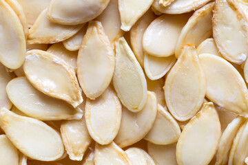 Natural pumpkin seeds close-up. Lots of pumpkin seeds