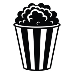 A black and white popcorn bucket overflows, offering a simple yet classic treat