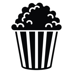 A full black and white striped popcorn bucket offers a classic cinema snack