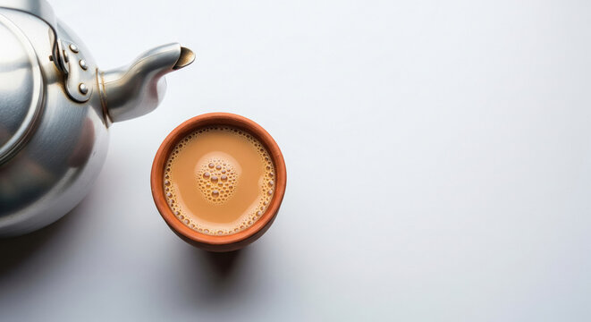 Traditional Indian Chai in Kulhad with Kettle, White Background - Powered by Adobe