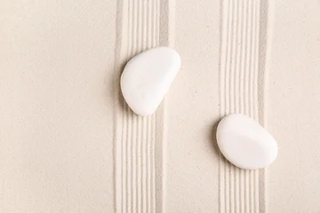 Selbstklebende Fototapeten Zen Steine Composition with spa stones and lines on sand as background, closeup. Zen concept  © Pixel-Shot