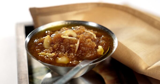Moong dal halwa is a classic Indian sweet dish made with moong lentils, sugar, ghee and cardamom powder	
