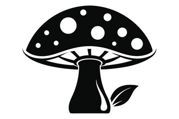 Black mushroom with white spots stands near a leaf in a image
