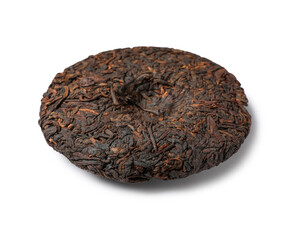Dry pressed puer tea on white background