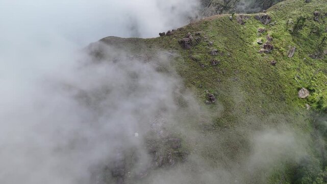 Top View Mulayit Taung golden light of the morning sun and the mist covered on Mount Mulayit,Myanmar
