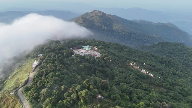 Top View Mulayit Taung golden light of the morning sun and the mist covered on Mount Mulayit,Myanmar
