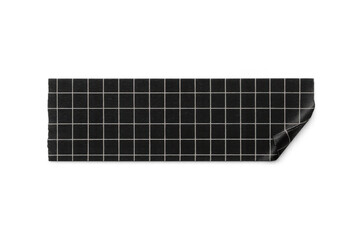 Black graph paper adhesive tape strip with curled corner, offering a versatile design element on transparent background
