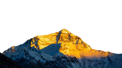 Snow-capped mountain peak illuminated by golden sunlight against a clear sky