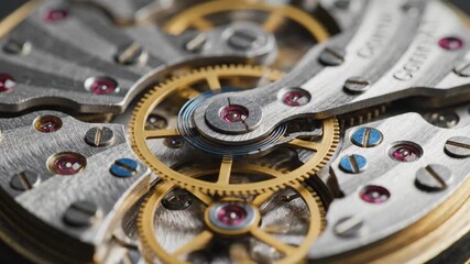Intricate mechanical gears and components of a finely crafted pocket watch movement in detailed close up