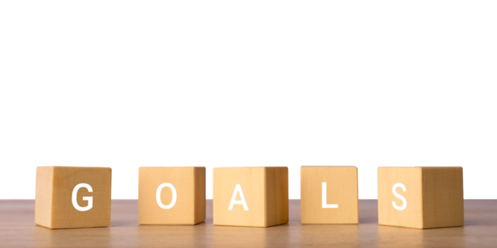 Wooden blocks with word goals for business success, isolated on transparent background