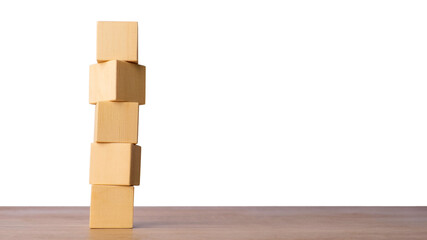 Stack of wooden cubes symbolizing balance and risk, isolated on transparent background