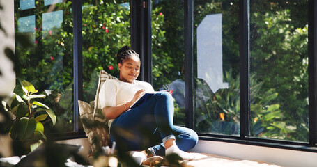 Creative, writing and woman with journal, window and writer with smile in house, planning and ideas. Happy, author and black person with notebook for novel, brainstorming and notes for remote work