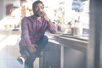 Happy man, conversation or phone with audio message in cafe for communication or network connection. Male person, customer and talking with mobile smartphone or speaker for voice note or discussion