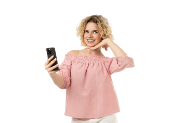 Woman smiles for a selfie with her phone, isolated on white, PNG