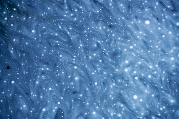 Swirling Blue Abstract Pattern with White Dots and Texture Elements