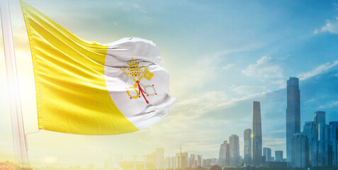 Vatican City flag wavering in beautiful clouds with building skyline. The flag with drone shot in...