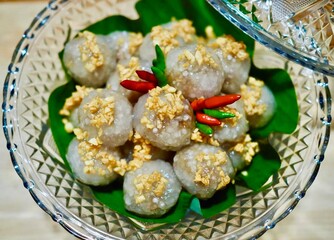 Tapioca balls with pork filing  is placed in a cup. It looks very delicious and appetizing. Thai food that made myself.