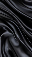Fototapeta premium Elegant Black Flowing Silk Fabric Draping with Exquisite Waves Pattern for Modern Fashion Luxury