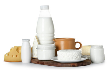 Wooden board with different dairy products on white background