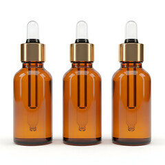 Three Amber Dropper Bottles with Gold Caps