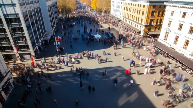 A bustling urban timelapse of a crowded city square with people moving like streams of energy and rapidly changing shadows against architectural landmarks, concept of vibrant city life and human activ
