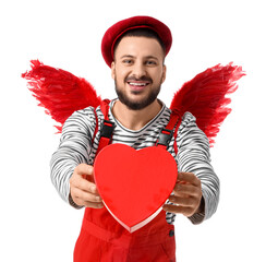Young man dressed as Cupid with heart on white background. Valentine's Day celebration
