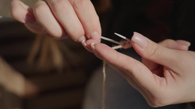 lady sewing outdoors under sunlight, farmer from asia meticulously stitching in bright sunlit outdoors, an asian farmer carefully performing detailed needlework in clear daylight outdoors