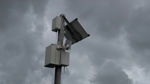 Emergency warning tower with solar panel