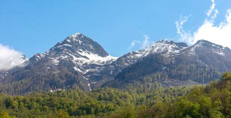 Fototapeta premium The mountains are covered in snow and the sky is clear