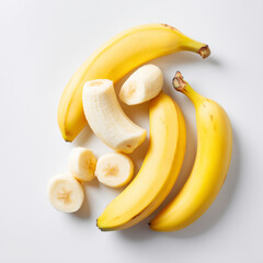 AI-generated image - Fresh whole and sliced bananas isolated on a white background. 
