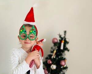 girl in santa claus hat