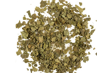 Dried Green Herb Flakes Scattered on a White Background. isolated on transparent background