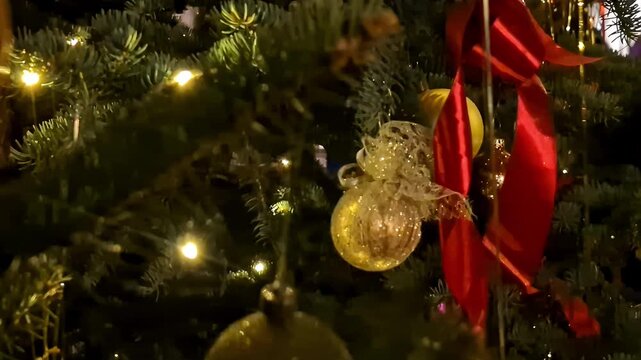 Sparkling ornaments and festive details on a decorated Christmas tree. Jelgava, Latvia