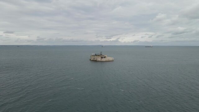 Aerial view St Helens Fort, sea fort in the Solent close to the Isle of Wight, was built as result of the Royal Commission on the Defence of the United Kingdom of 1859, drone moving towards the fort.