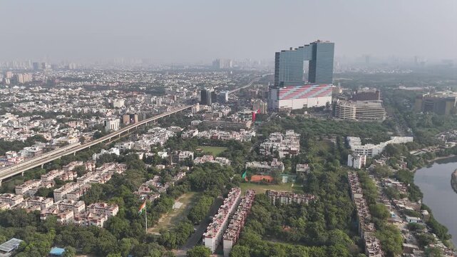 Drone footage capturing Noida&rsquo;s expanding skyline and well-planned roadways surrounded by residential and commercial spaces.