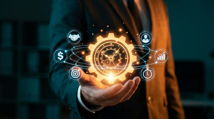 Business process management and automation for corporate efficiency. Businessman holding a glowing gear with workflow icons.