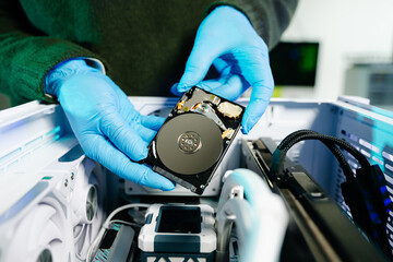 Showcasing expert computer hardware assembly and hard drive installation with precision and advanced technology for IT and electronics