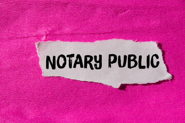 Notary public message written on ripped torn paper background. Conceptual Notary public symbol....