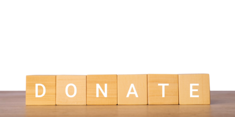 Wooden blocks with word donate for charity support concept, isolated on transparent background