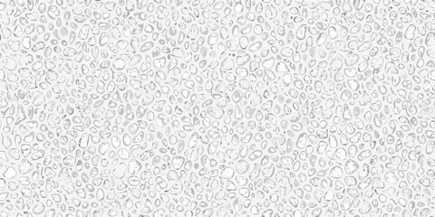 Monochrome pebble pattern background with soft shadows and subtle texture