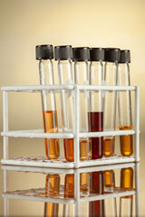 Several test tubes on the laboratory stand