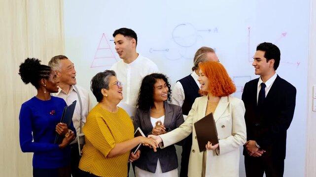 Diverse colleagues celebrate business success in modern office, smiling and cheering by whiteboard. Corporate scene highlights teamwork, leadership, multicultural spirit, and professional unity. 4k