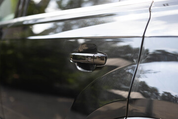 Car door handle. Keyless entry car door handle with keyless go touch sensor. Automatic opening of a...